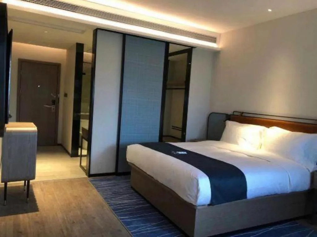 Bed in Echarm Hotel Liuzhou Yaobu Ancient Town