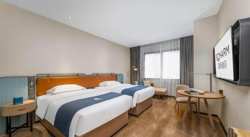 Bed in Echarm Hotel Liuzhou Yaobu Ancient Town