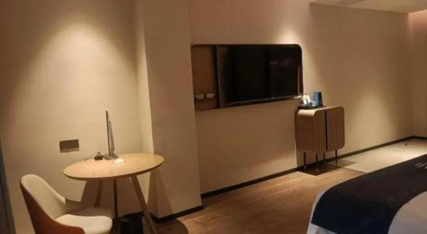 Bed in Echarm Hotel Liuzhou Yaobu Ancient Town