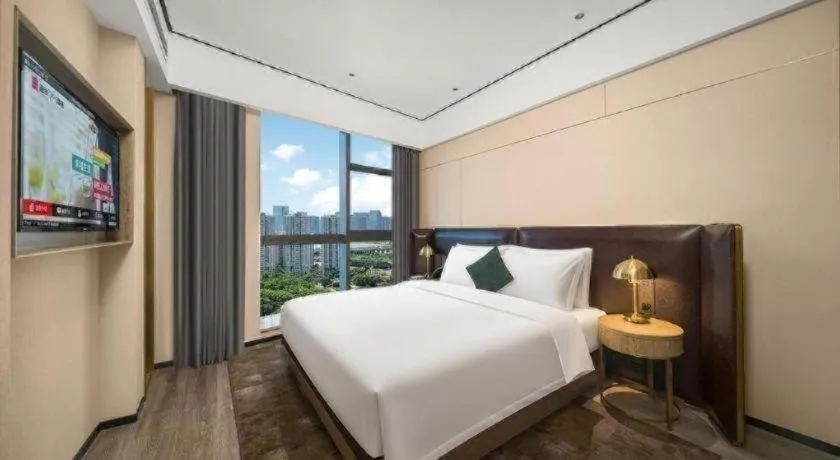 Bed in Premier City Comfort Hotel Quanzhou Wanda Plaza