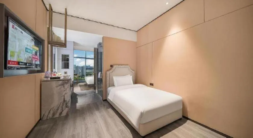 Bed in Premier City Comfort Hotel Quanzhou Wanda Plaza