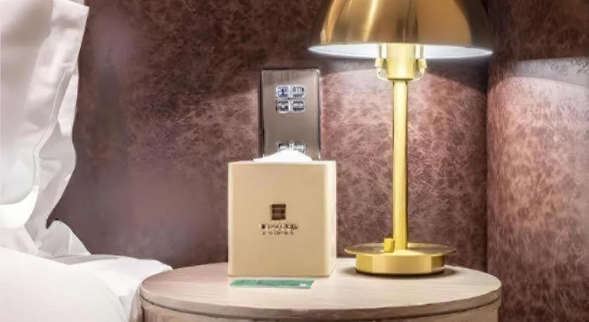 Bed in Premier City Comfort Hotel Quanzhou Wanda Plaza