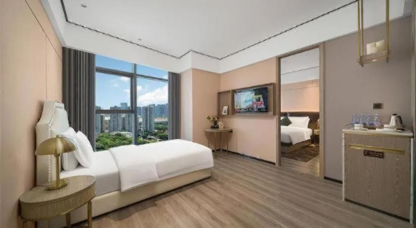 Bed in Premier City Comfort Hotel Quanzhou Wanda Plaza