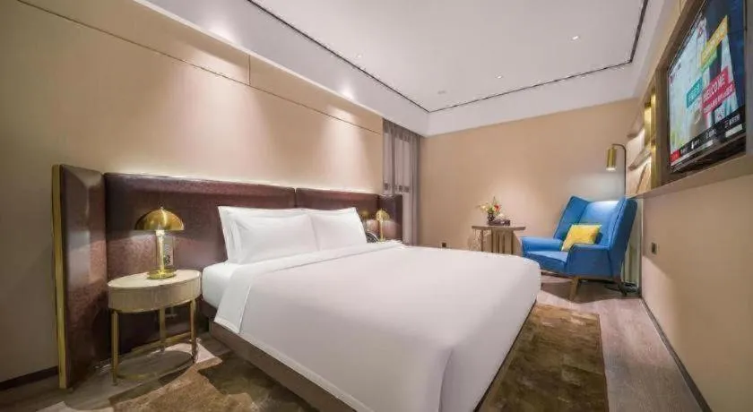 Bed in Premier City Comfort Hotel Quanzhou Wanda Plaza