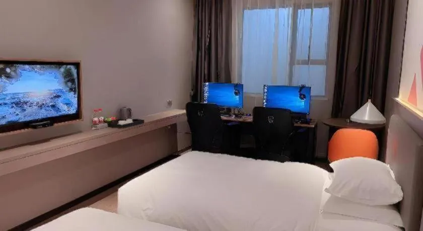 Bed in Borrman Hotel Zhonghsan Guzheng Huayi Plaza Light Rail Station