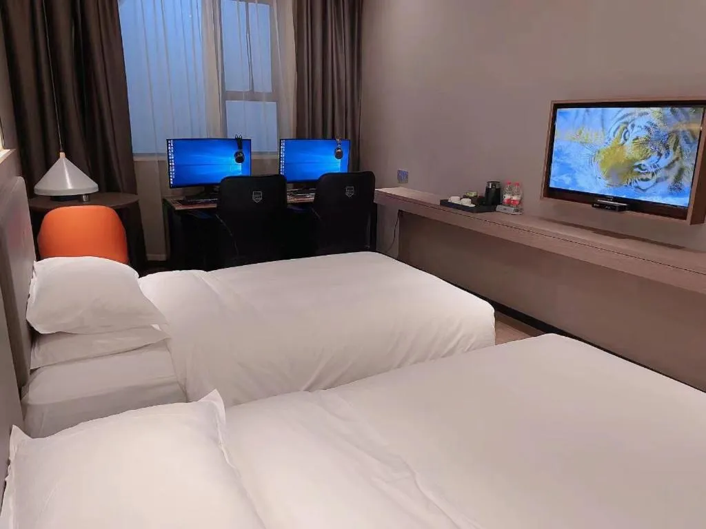 Bed in Borrman Hotel Zhonghsan Guzheng Huayi Plaza Light Rail Station