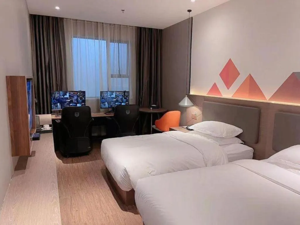 Bed in Borrman Hotel Zhonghsan Guzheng Huayi Plaza Light Rail Station