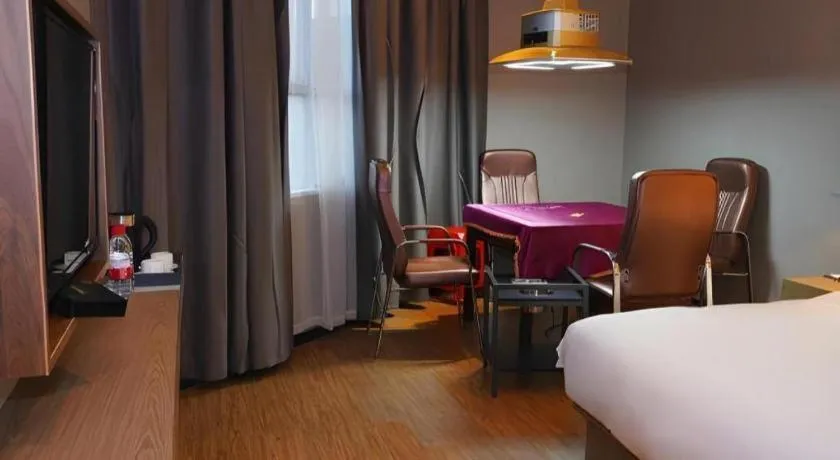 Bed in Borrman Hotel Zhonghsan Guzheng Huayi Plaza Light Rail Station