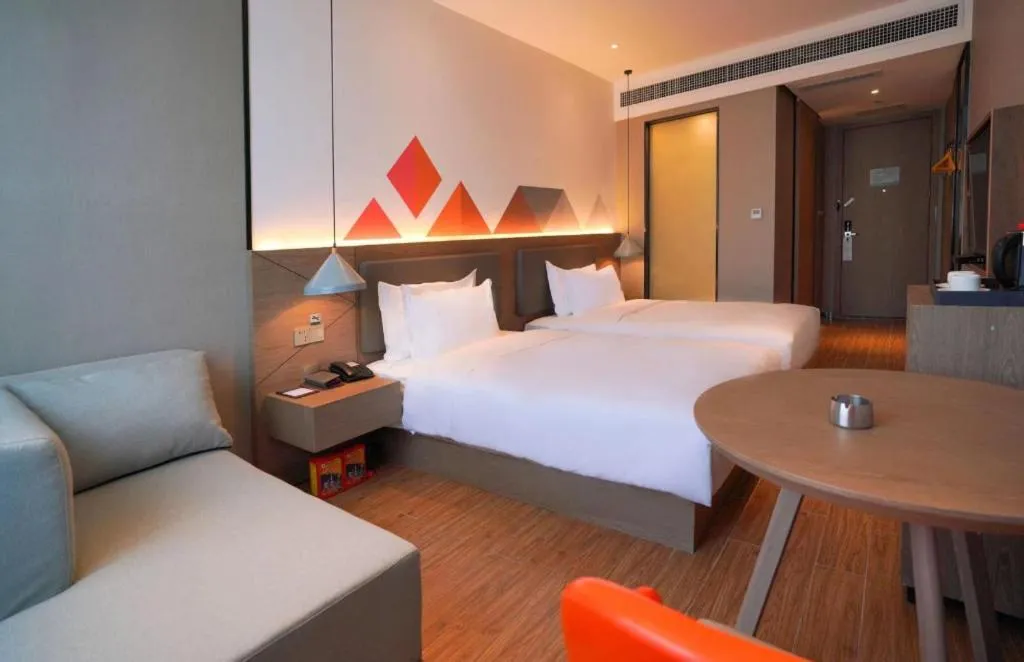 Bed in Borrman Hotel Zhonghsan Guzheng Huayi Plaza Light Rail Station