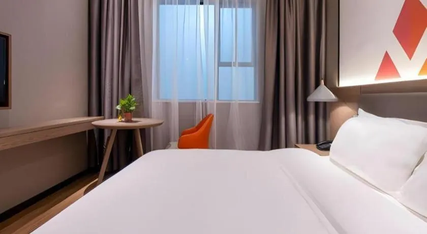 Bed in Borrman Hotel Zhonghsan Guzheng Huayi Plaza Light Rail Station