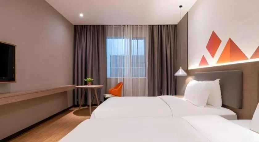 Bed in Borrman Hotel Zhonghsan Guzheng Huayi Plaza Light Rail Station