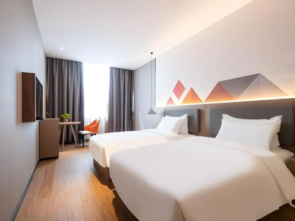 Bed in Borrman Hotel Zhonghsan Guzheng Huayi Plaza Light Rail Station