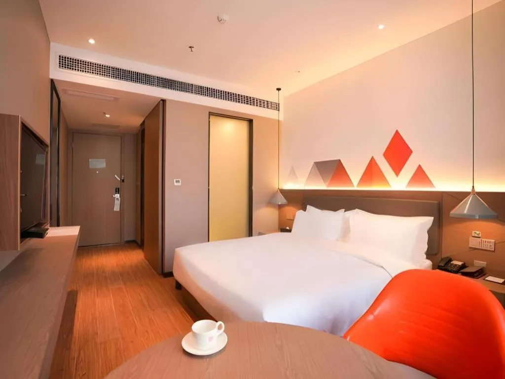 Bed in Borrman Hotel Zhonghsan Guzheng Huayi Plaza Light Rail Station