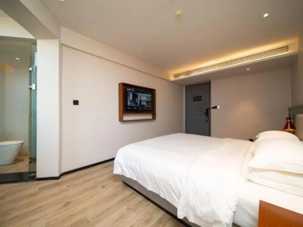 Bed in Premier City Comfort Hotel Wuhan Yellow Crane Shouyi Road Metro Station