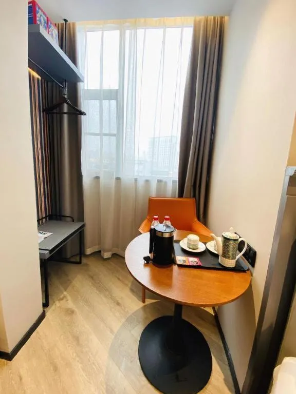 Bed in Premier City Comfort Hotel Wuhan Yellow Crane Shouyi Road Metro Station