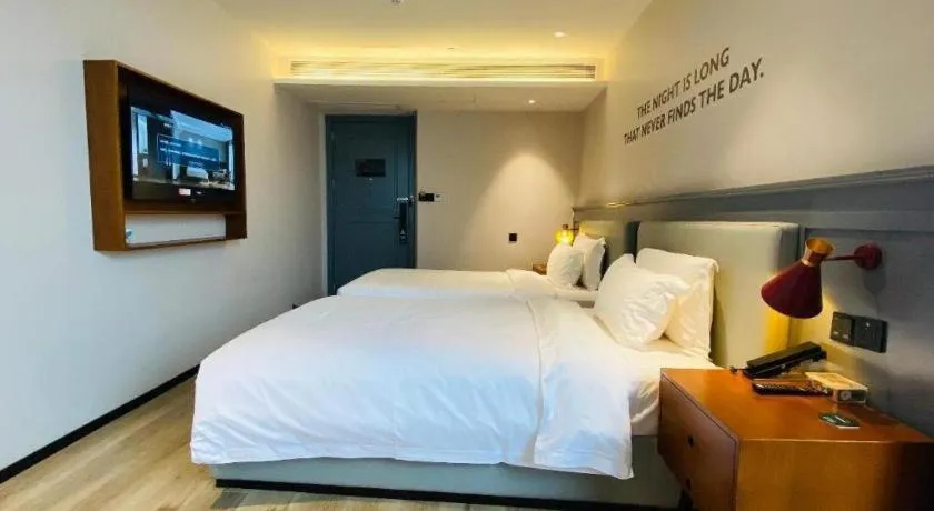 Bed in Premier City Comfort Hotel Wuhan Yellow Crane Shouyi Road Metro Station