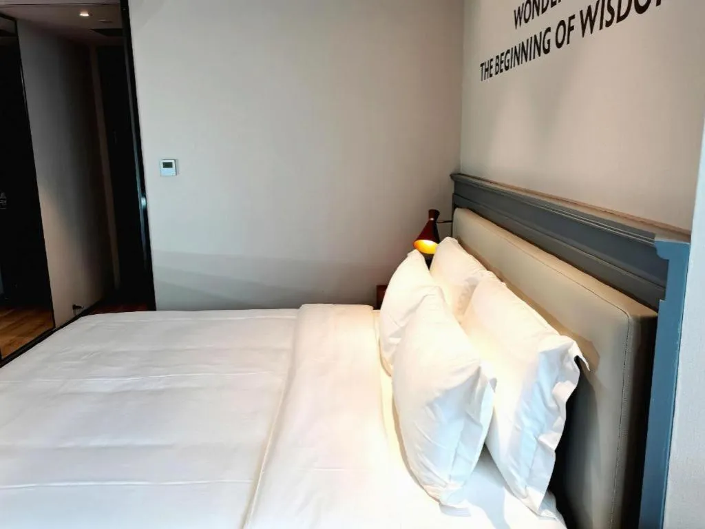 Bed in Premier City Comfort Hotel Wuhan Yellow Crane Shouyi Road Metro Station