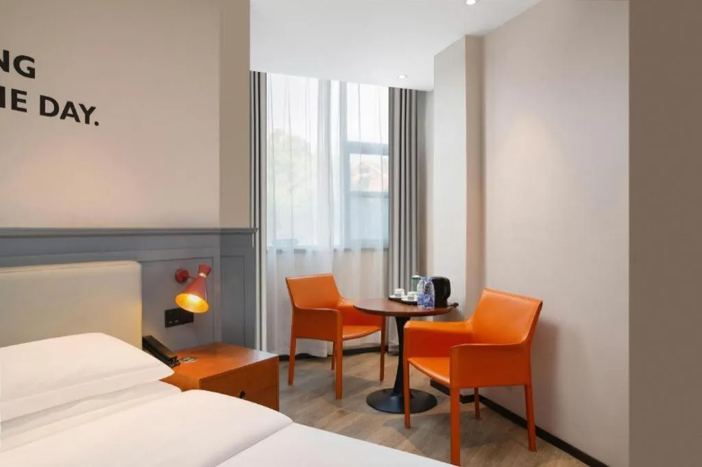 Bed in Premier City Comfort Hotel Wuhan Yellow Crane Shouyi Road Metro Station