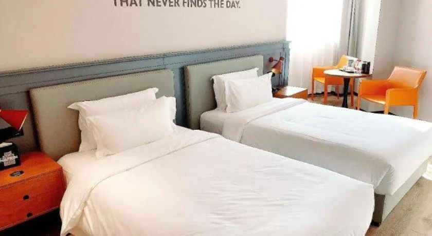 Bed in Premier City Comfort Hotel Wuhan Yellow Crane Shouyi Road Metro Station