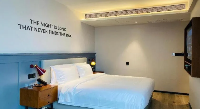 Bed in Premier City Comfort Hotel Wuhan Yellow Crane Shouyi Road Metro Station