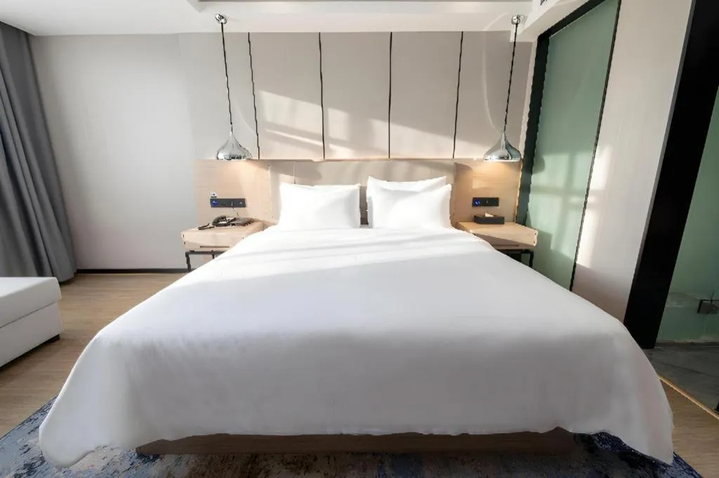 Bed in Borrman Hotel Changsha Meixi Lake West Bus Station Lugu