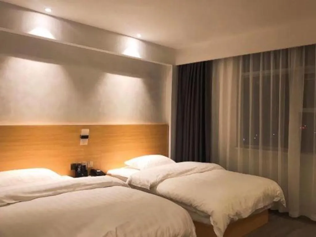 Bed in Borrman Hotel Fangchenggang Qisha