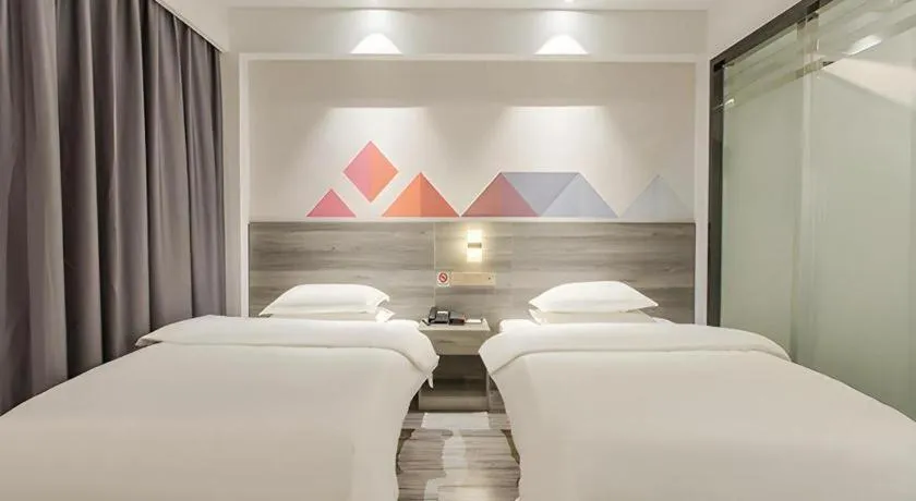 Bed in Borrman Hotel Fangchenggang Qisha