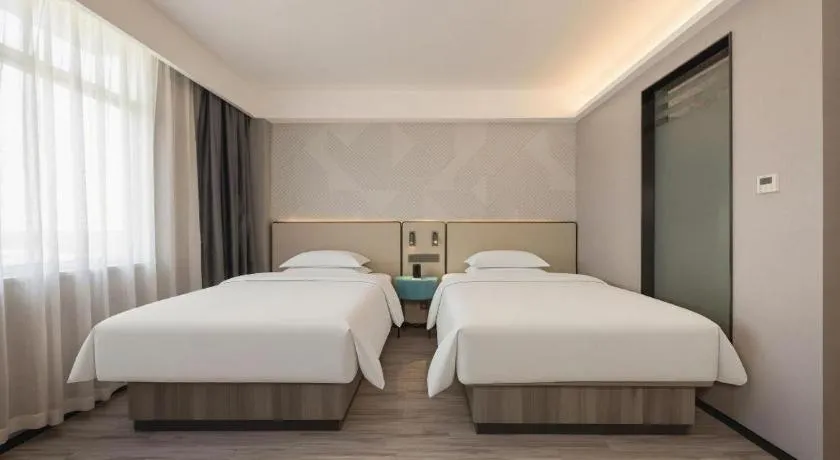 Bed in Borrman Hotel Fangchenggang Qisha