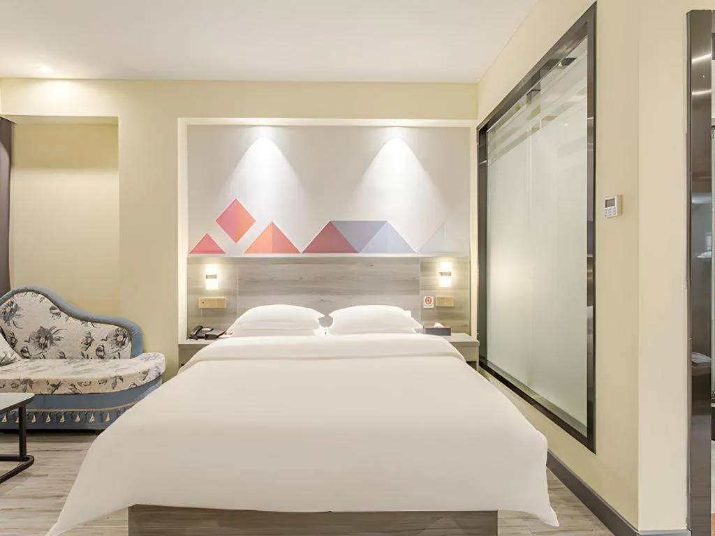 Bed in Borrman Hotel Fangchenggang Qisha