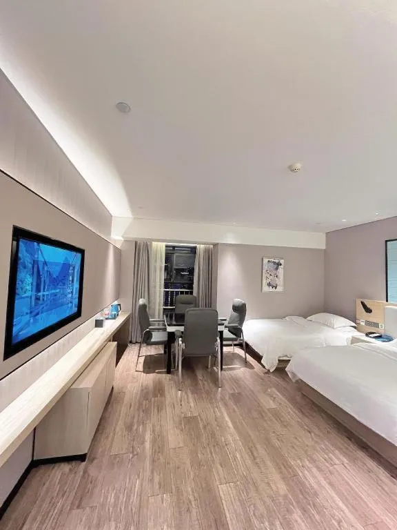 Bed in Echarm Hotel Suzhou Shengze Oriental Extile City