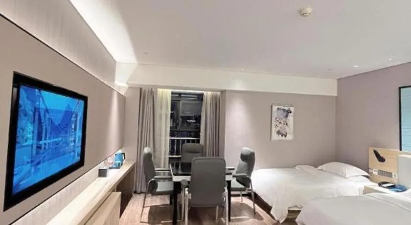 Bed in Echarm Hotel Suzhou Shengze Oriental Extile City