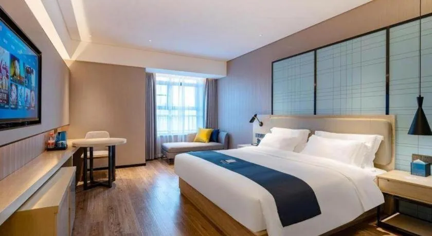 Bed in Echarm Hotel Suzhou Shengze Oriental Extile City