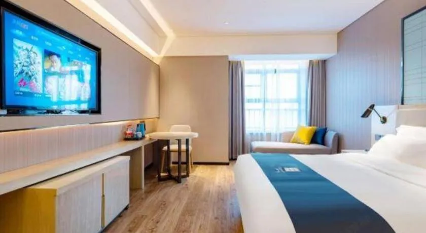 Bed in Echarm Hotel Suzhou Shengze Oriental Extile City