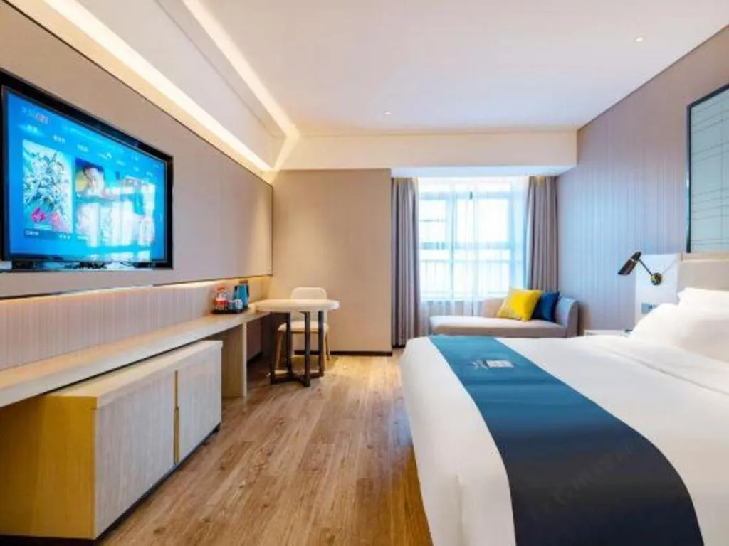 Bed in Echarm Hotel Suzhou Shengze Oriental Extile City