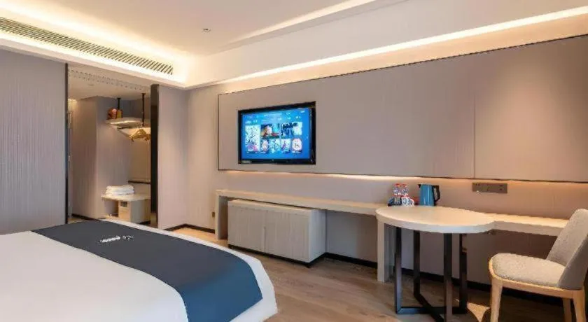 Bed in Echarm Hotel Suzhou Shengze Oriental Extile City