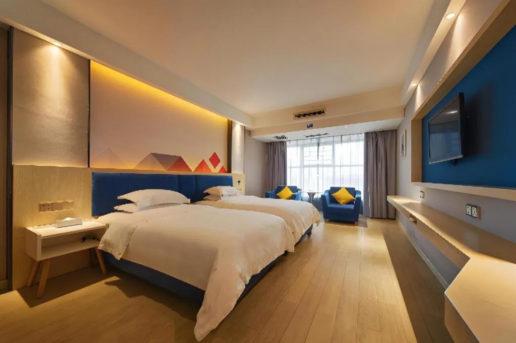 Bed in Borrman Hotel Liuzhou High-Speed Railway Station