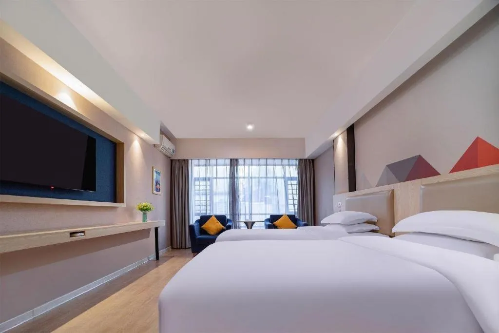 Bed in Borrman Hotel Liuzhou High-Speed Railway Station