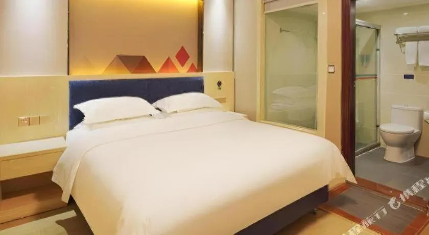 Bed in Borrman Hotel Liuzhou High-Speed Railway Station