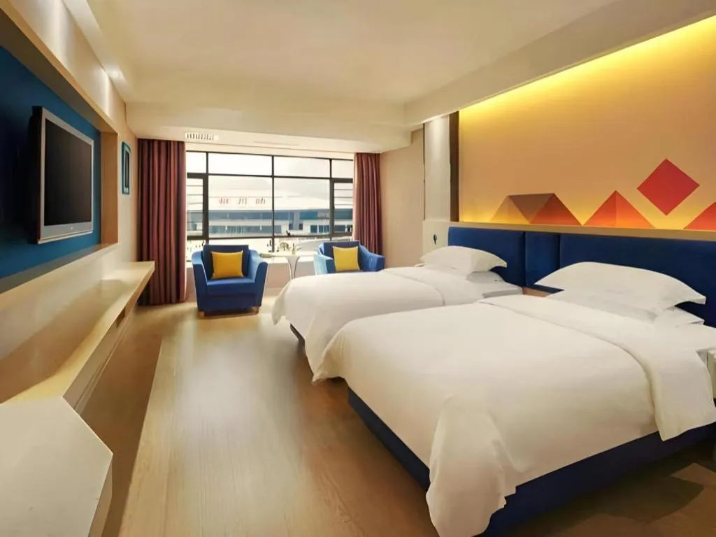 Bed in Borrman Hotel Liuzhou High-Speed Railway Station