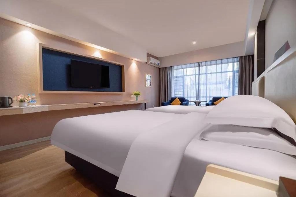 Bed in Borrman Hotel Liuzhou High-Speed Railway Station