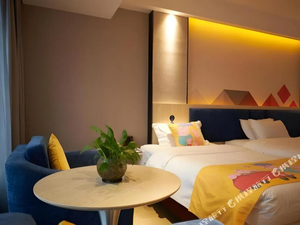 Bed in Borrman Hotel Liuzhou High-Speed Railway Station