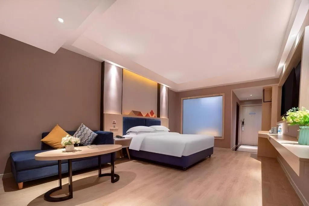 Bed in Borrman Hotel Liuzhou High-Speed Railway Station