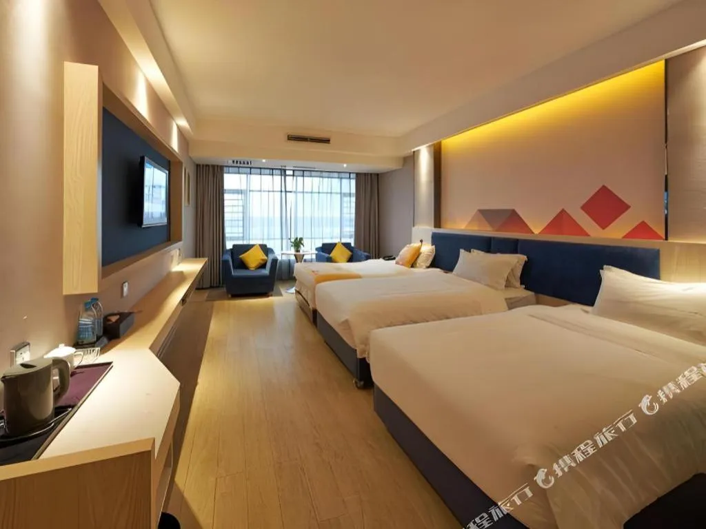 Bed in Borrman Hotel Liuzhou High-Speed Railway Station