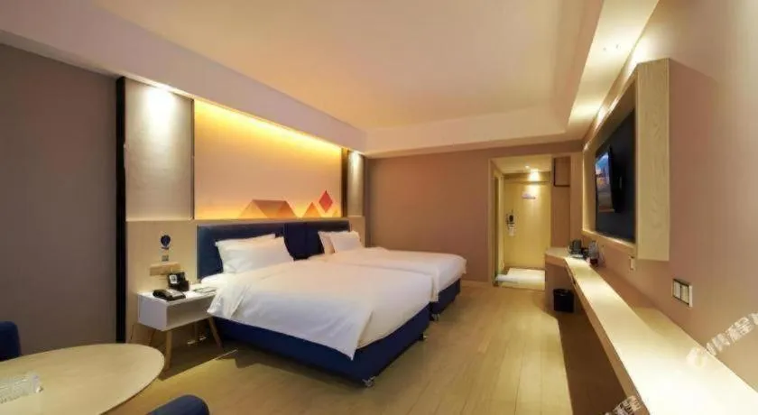 Bed in Borrman Hotel Liuzhou High-Speed Railway Station