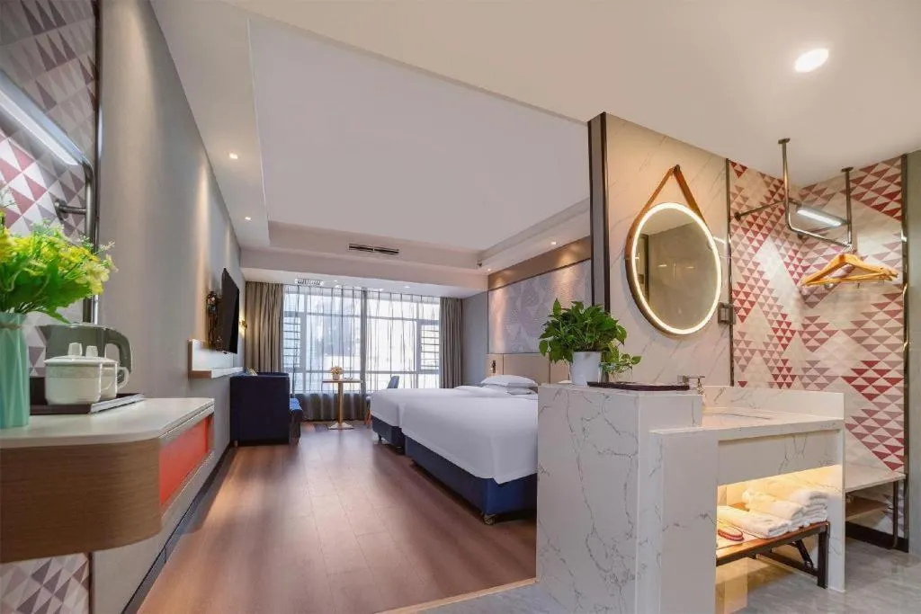 Bed in Borrman Hotel Liuzhou High-Speed Railway Station