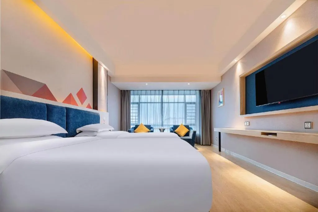 Bed in Borrman Hotel Liuzhou High-Speed Railway Station