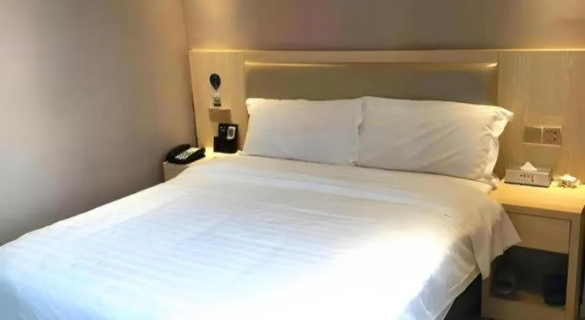 Bed in Borrman Hotel Liuzhou High-Speed Railway Station