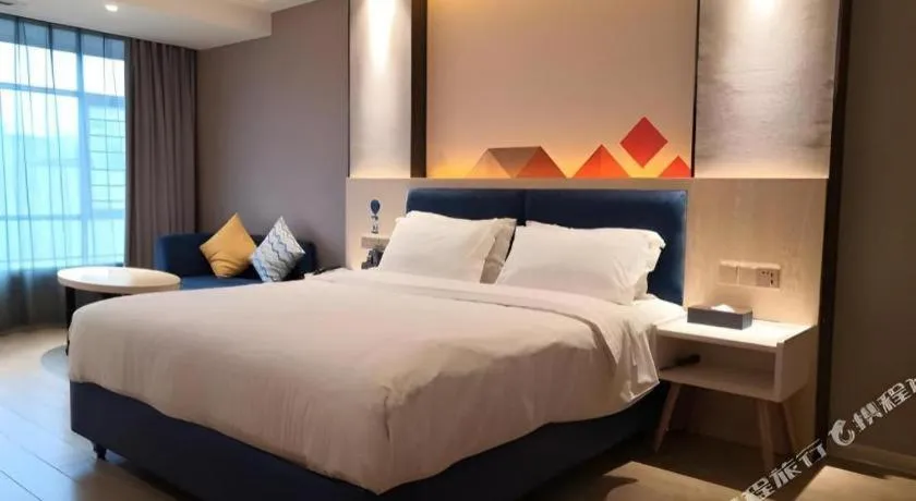 Bed in Borrman Hotel Liuzhou High-Speed Railway Station