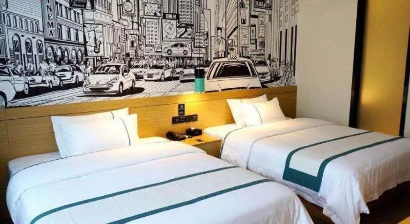 Bed in City Comfort Inn Shaoguan Biguiyuan Phoenix City Gold Village
