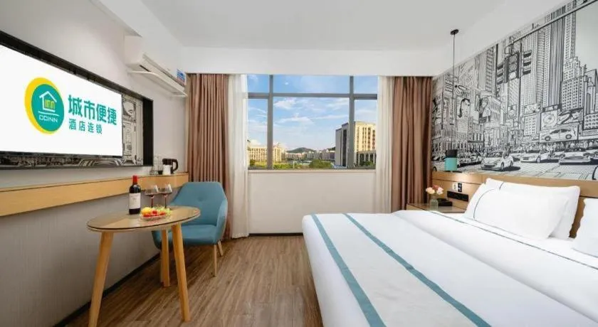 Bed in City Comfort Inn Shaoguan Biguiyuan Phoenix City Gold Village